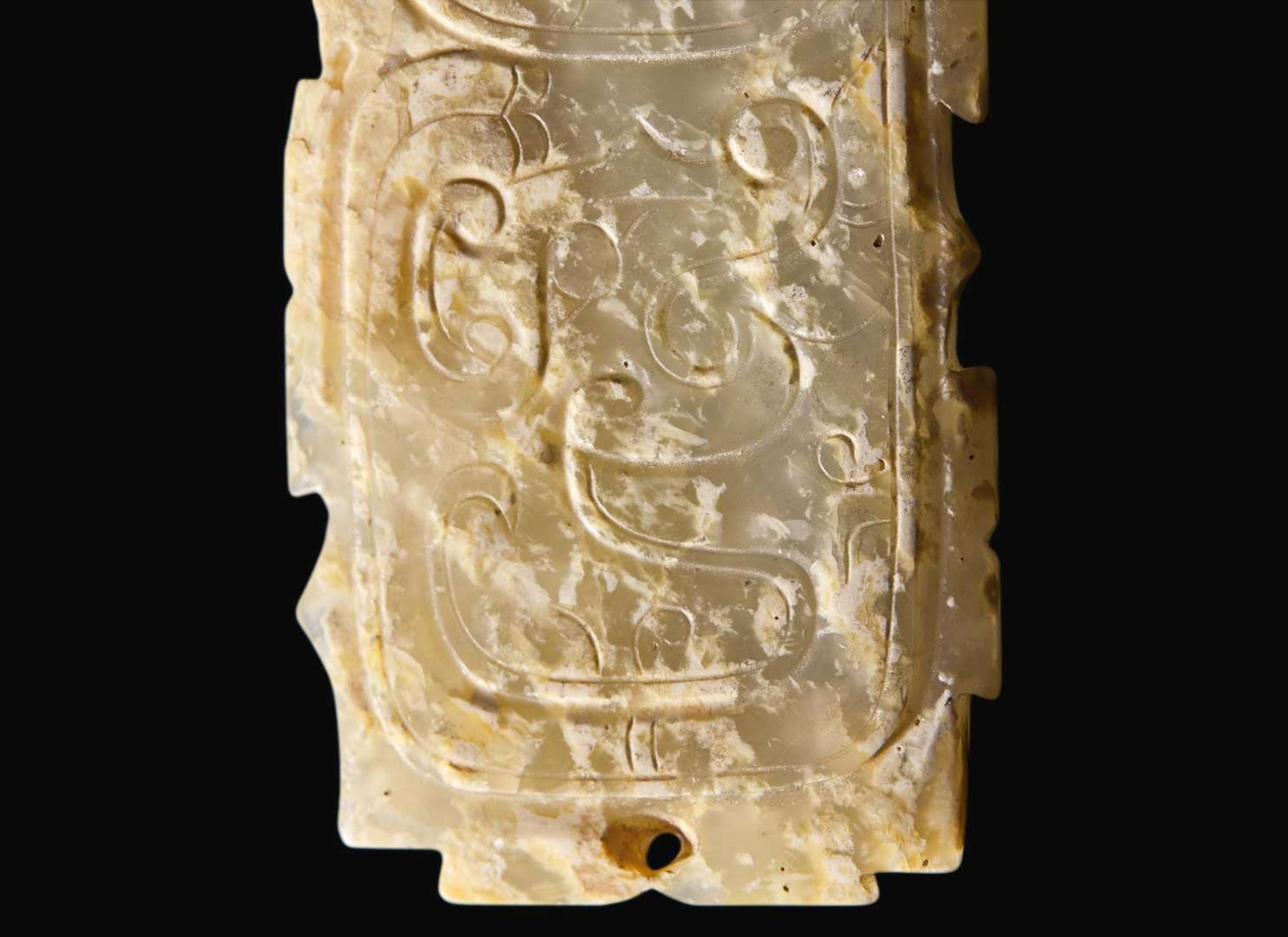 A Chinese "Dragon and Phoenix" calcified jade fitting, probably Western Zhou 龍鳳紋玉牌飾 或西周