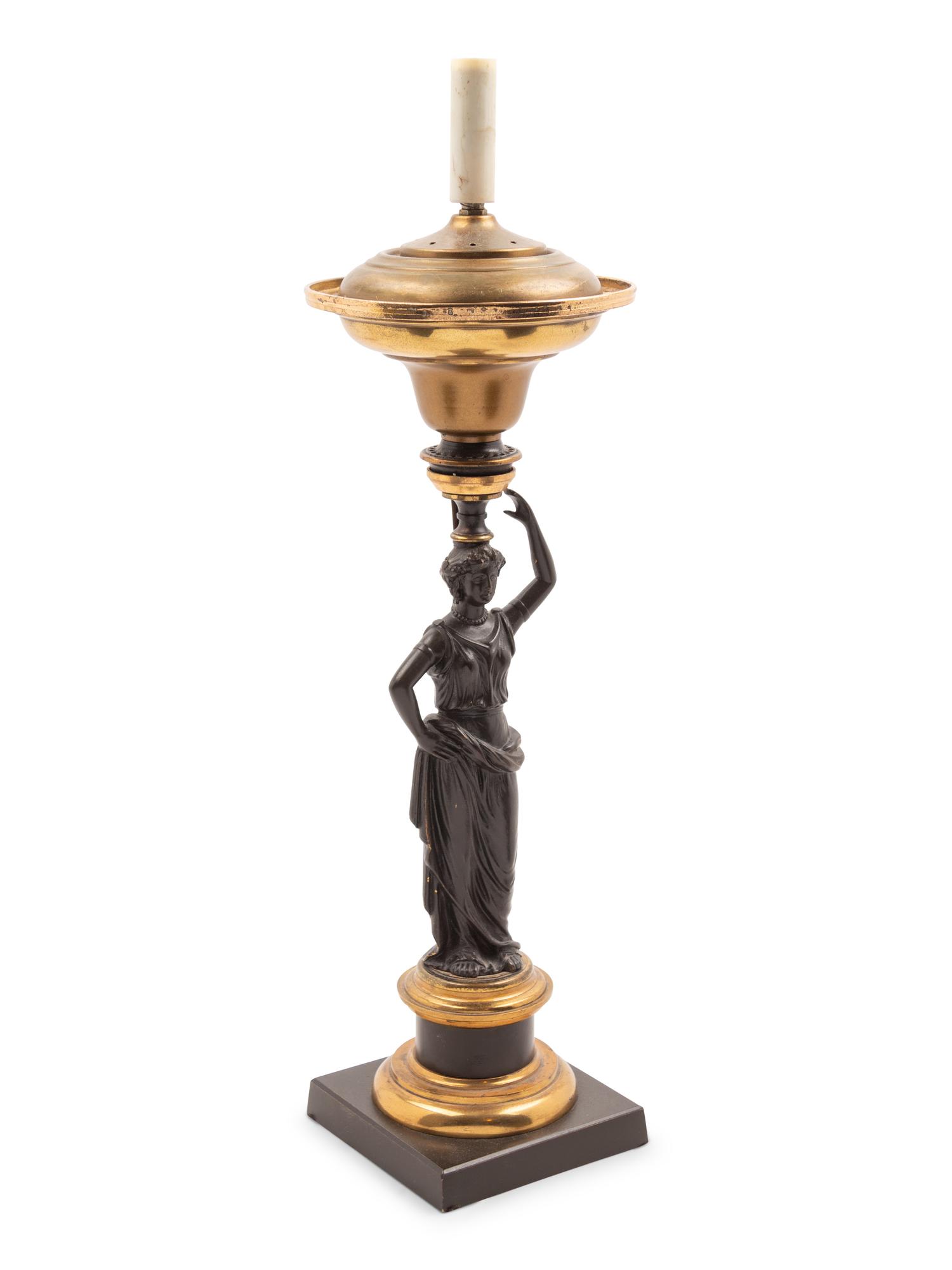 A Classical Patinated Bronze Figural Sinumbra Lamp