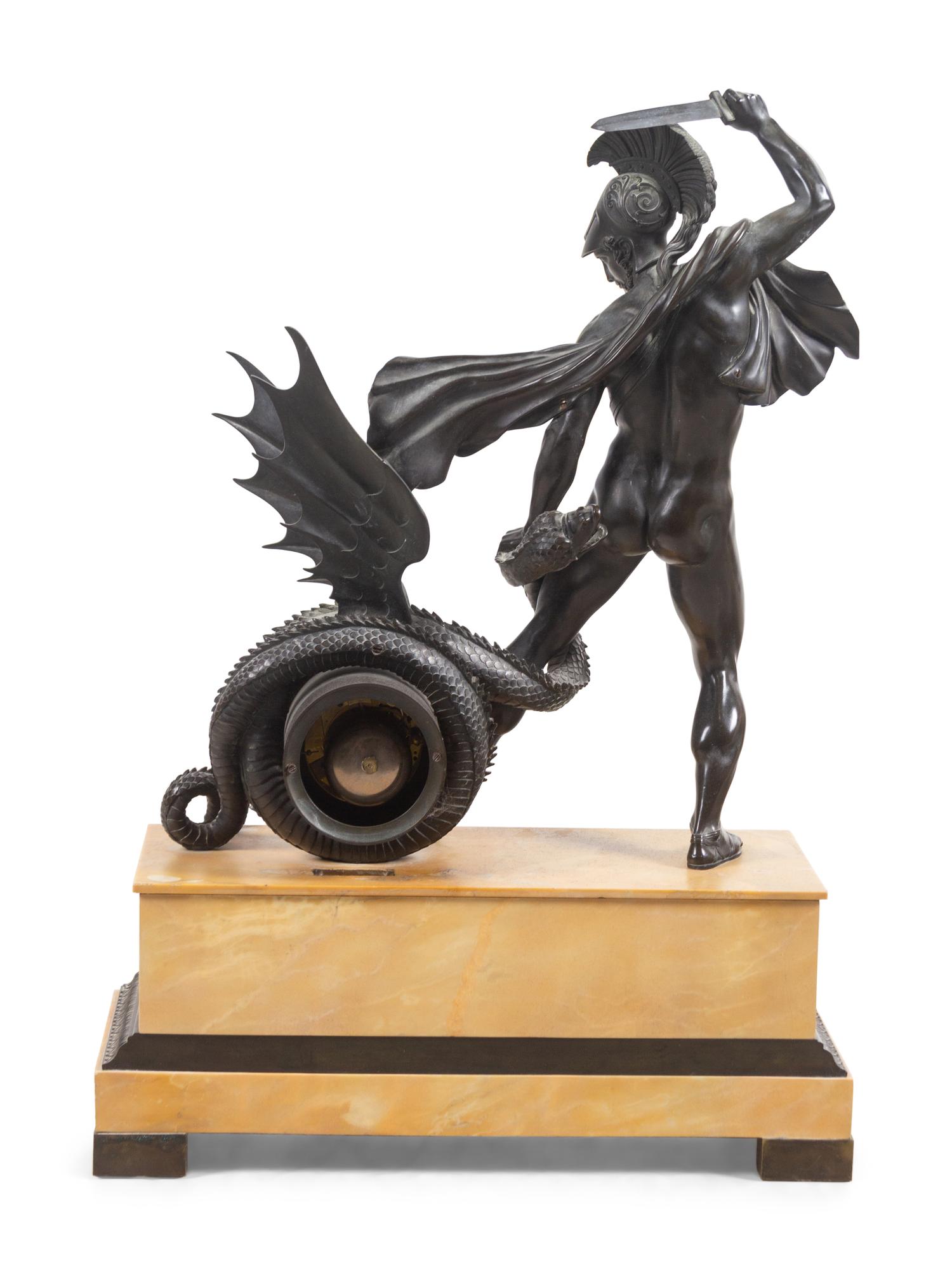 An Empire Bronze Mounted Sienna Marble Figural Mantel Clock