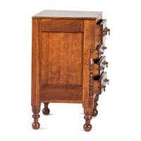 A Classical Cherrywood and Maple Child’s Chest