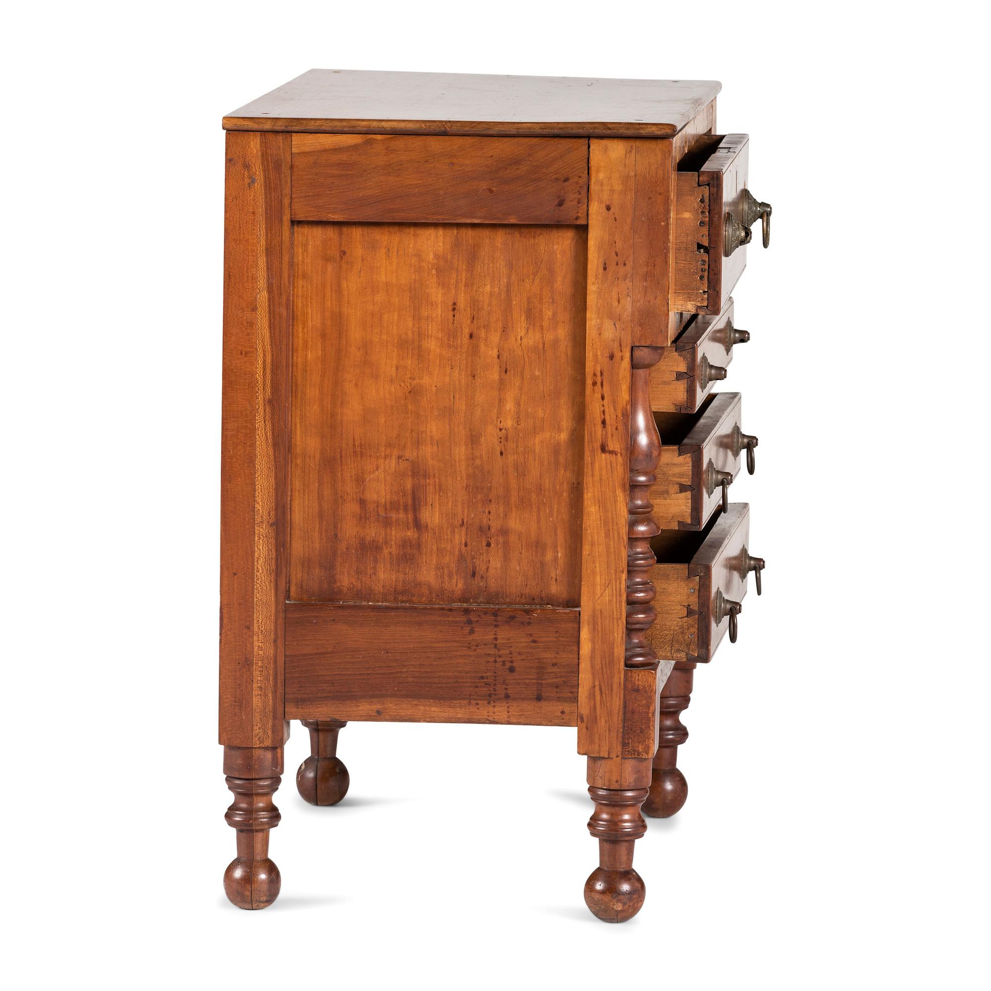 A Classical Cherrywood and Maple Child’s Chest