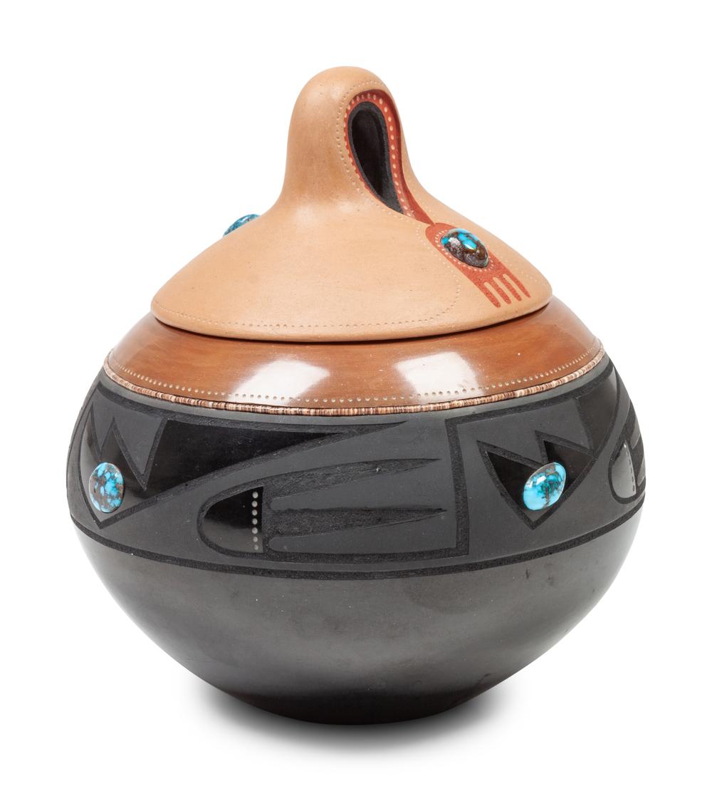 <div><!--block-->Black and Sienna Lidded Jar, with Turquoise Cabochons&nbsp;</div>