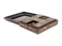 A Chinese Export Black Lacquer and Parcel-Gilt Game Box
