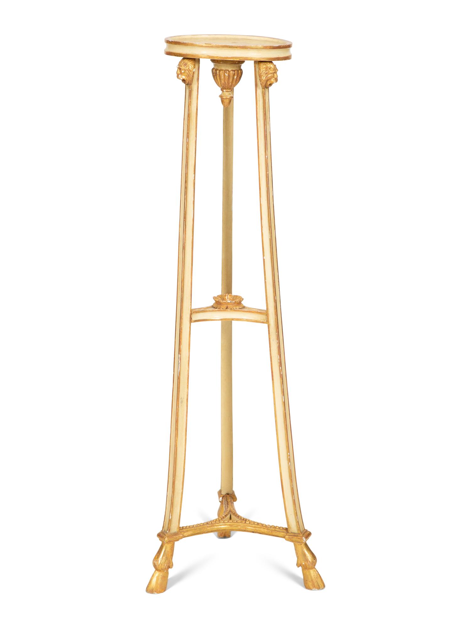 A George III Style Painted and Parcel Gilt Torchere Stand