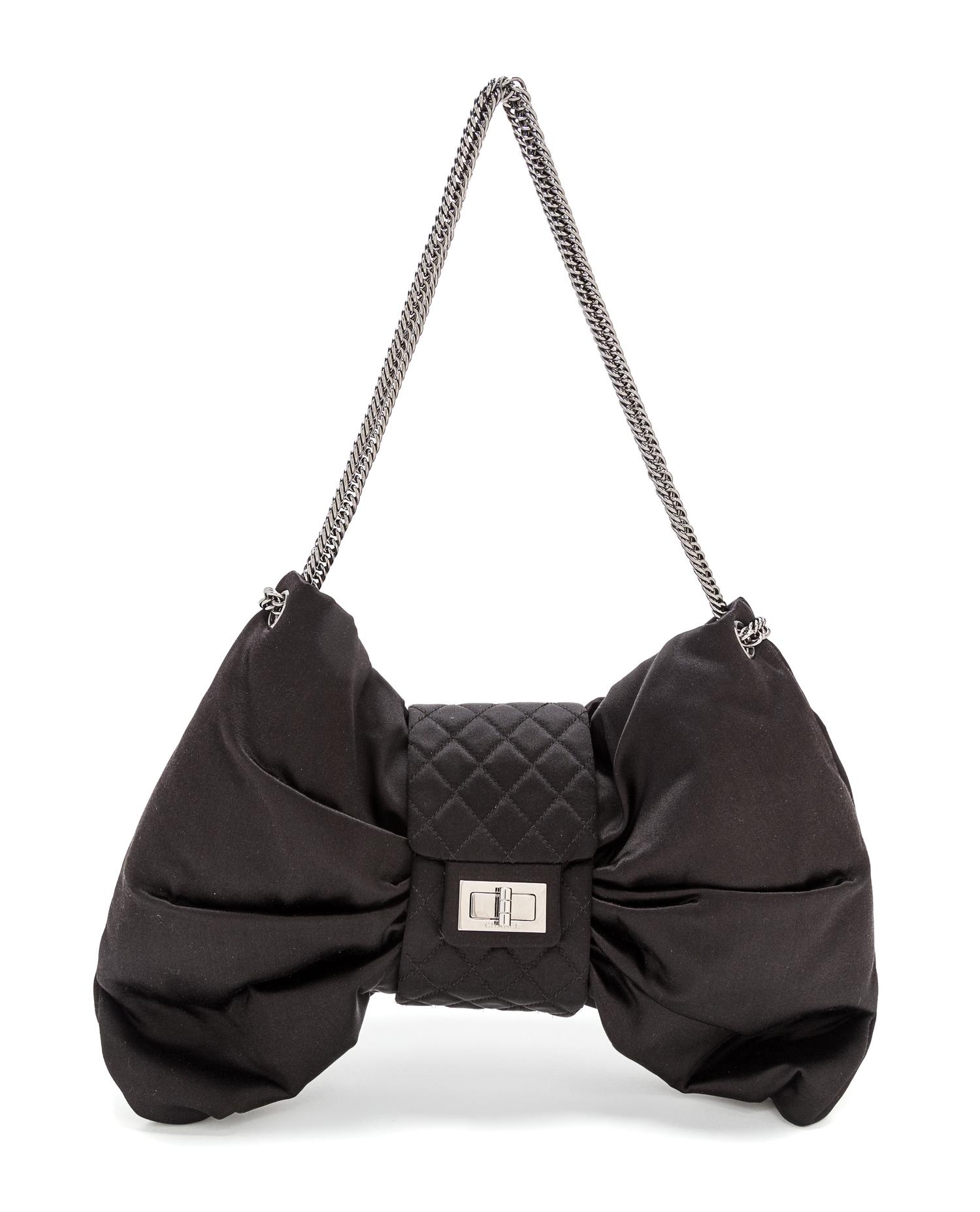 A Chanel Black Satin Bow Handbag, 14.5" x 8" x 2.5"; Strap drop 10.5''.