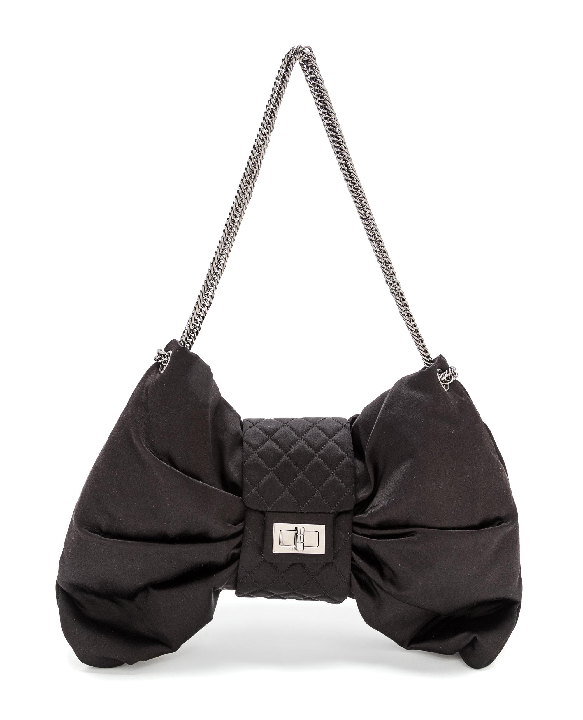 A Chanel Black Satin Bow Handbag, 14.5" x 8" x 2.5"; Strap drop 10.5''.