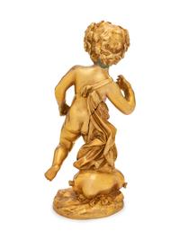 A Continental Gilt Bronze Figure of a Bacchic Putto