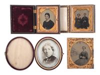 [EARLY PHOTOGRAPHY]. A group of 20 assorted portraits of women of varying ages, highlighted by half plate daguerreotype of two women, possibly sisters.