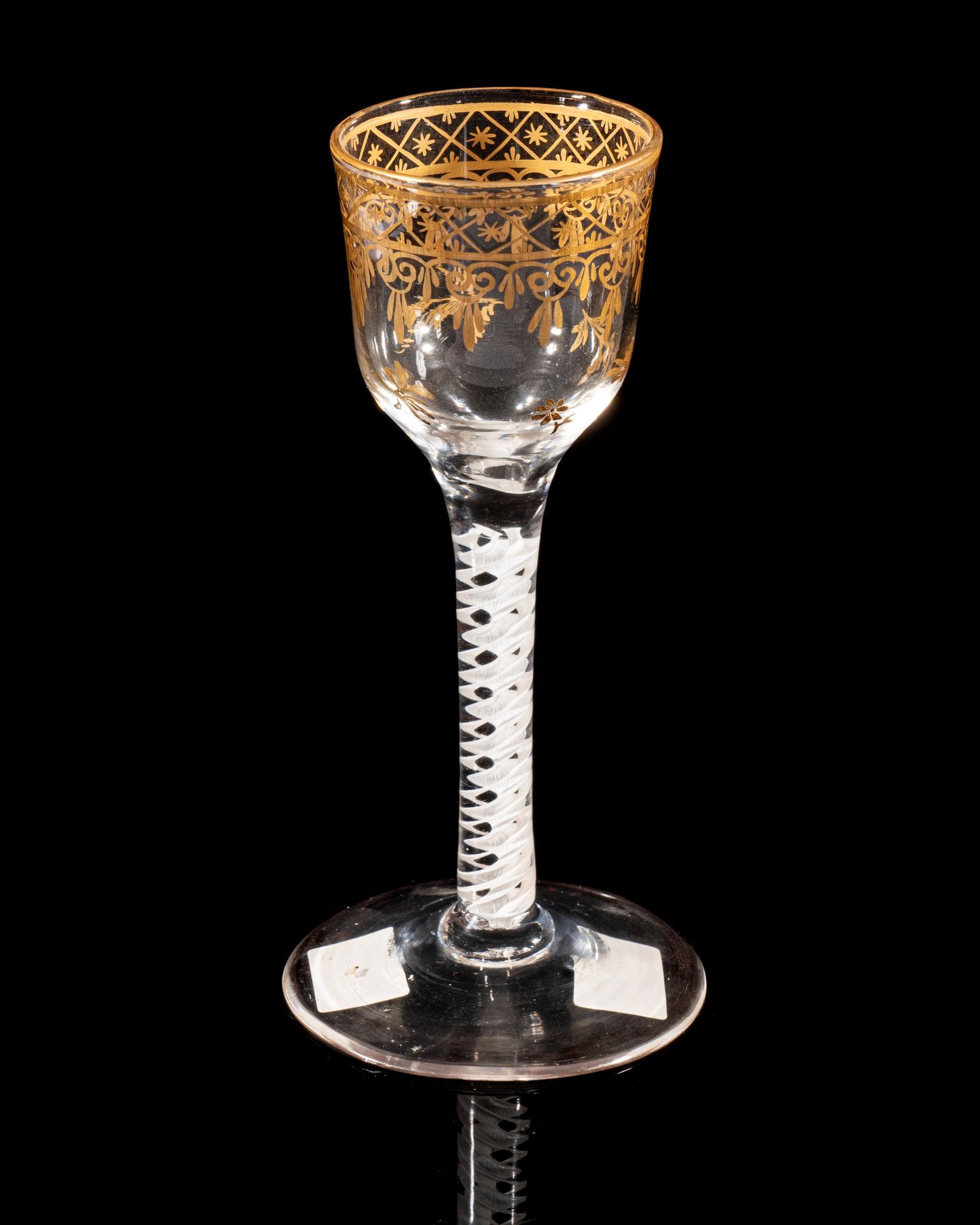 A Giles Gilt Decorated Opaque Twist Wine Glass