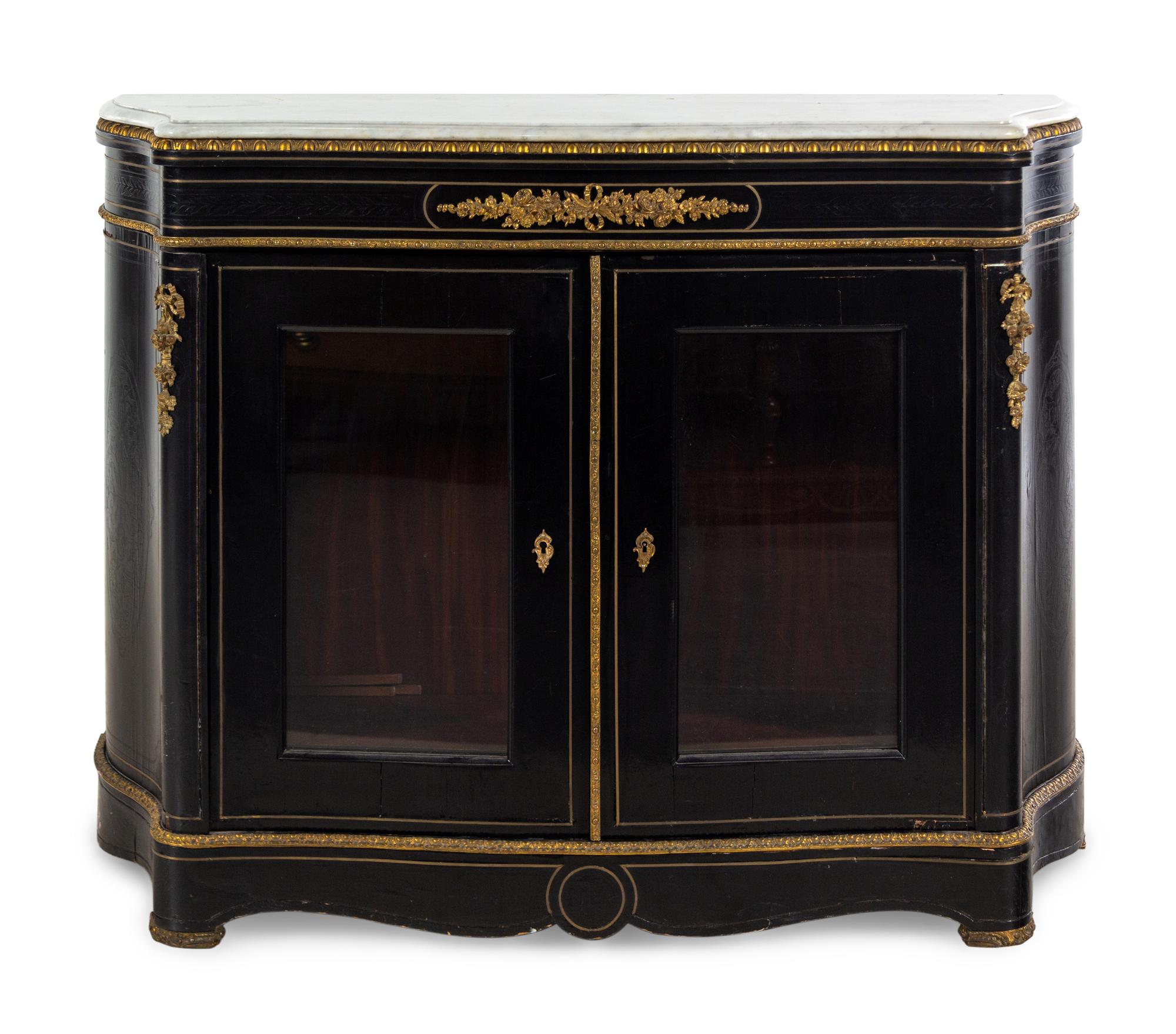 A Napoleon III Style Ebonized Marble-Top Cabinet