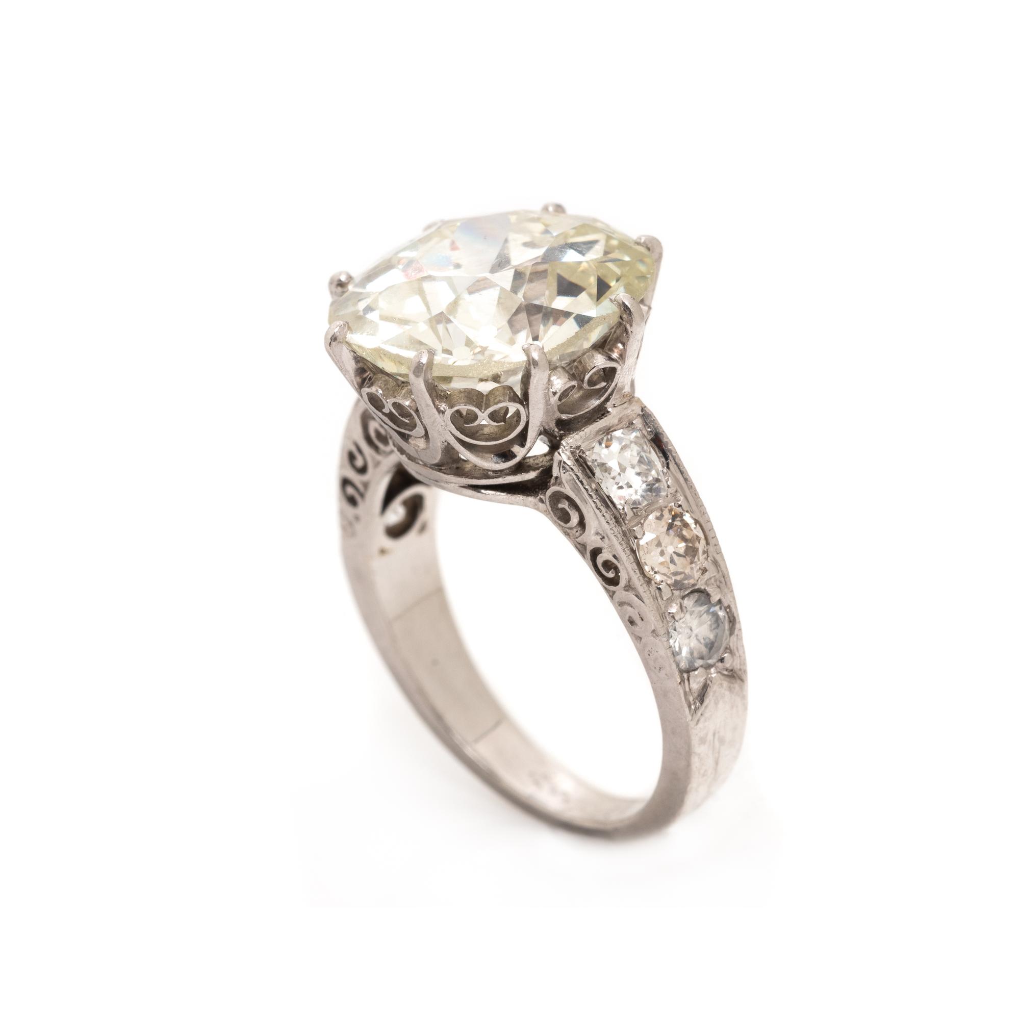 ANTIQUE, PLATINUM AND DIAMOND RING