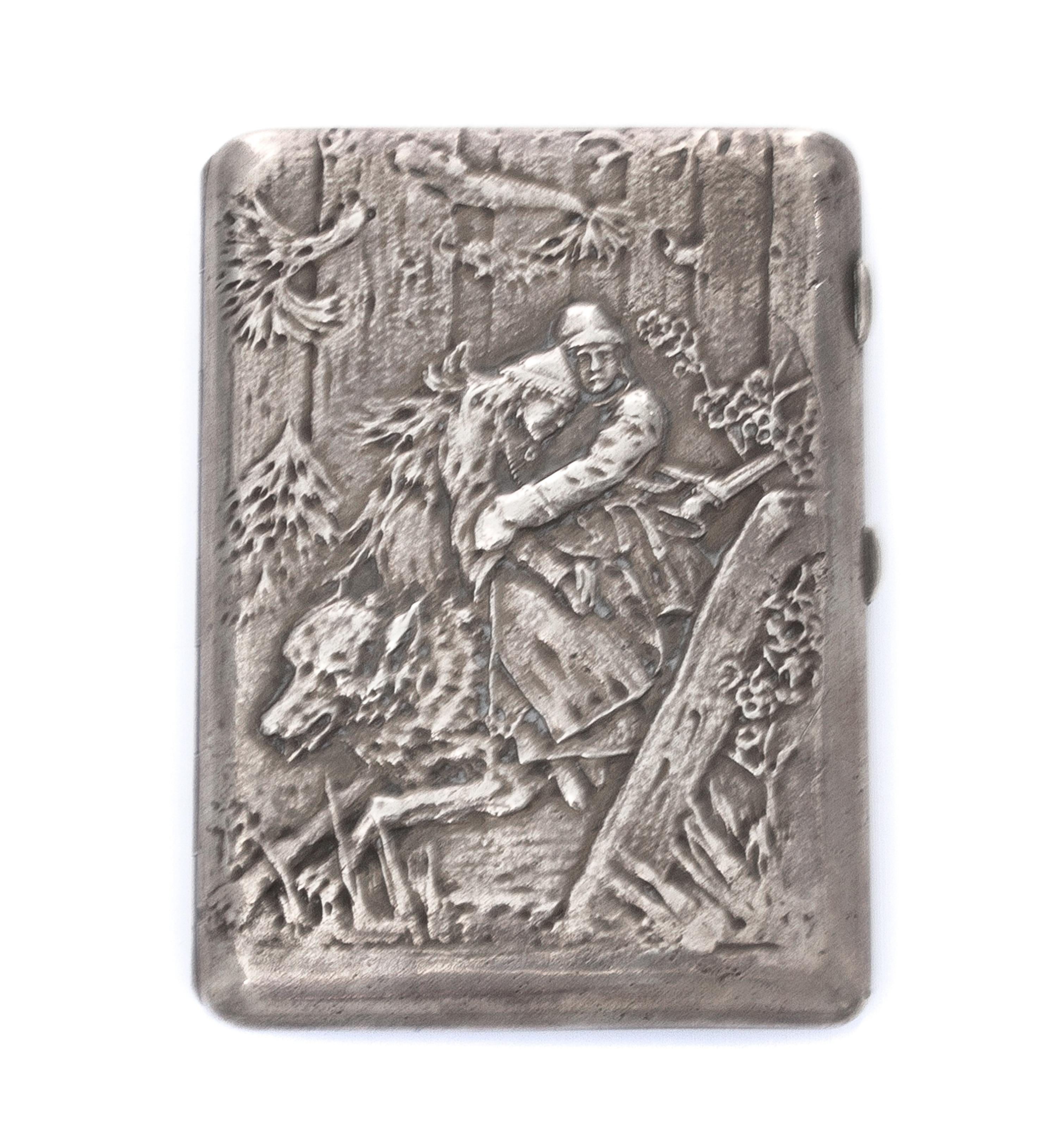 A Ukrainian Silver Cigarette Case, Maker's mark Cyrillic 4YuK, Kiev, of rectangular form, the lid worked to show a man and woman riding