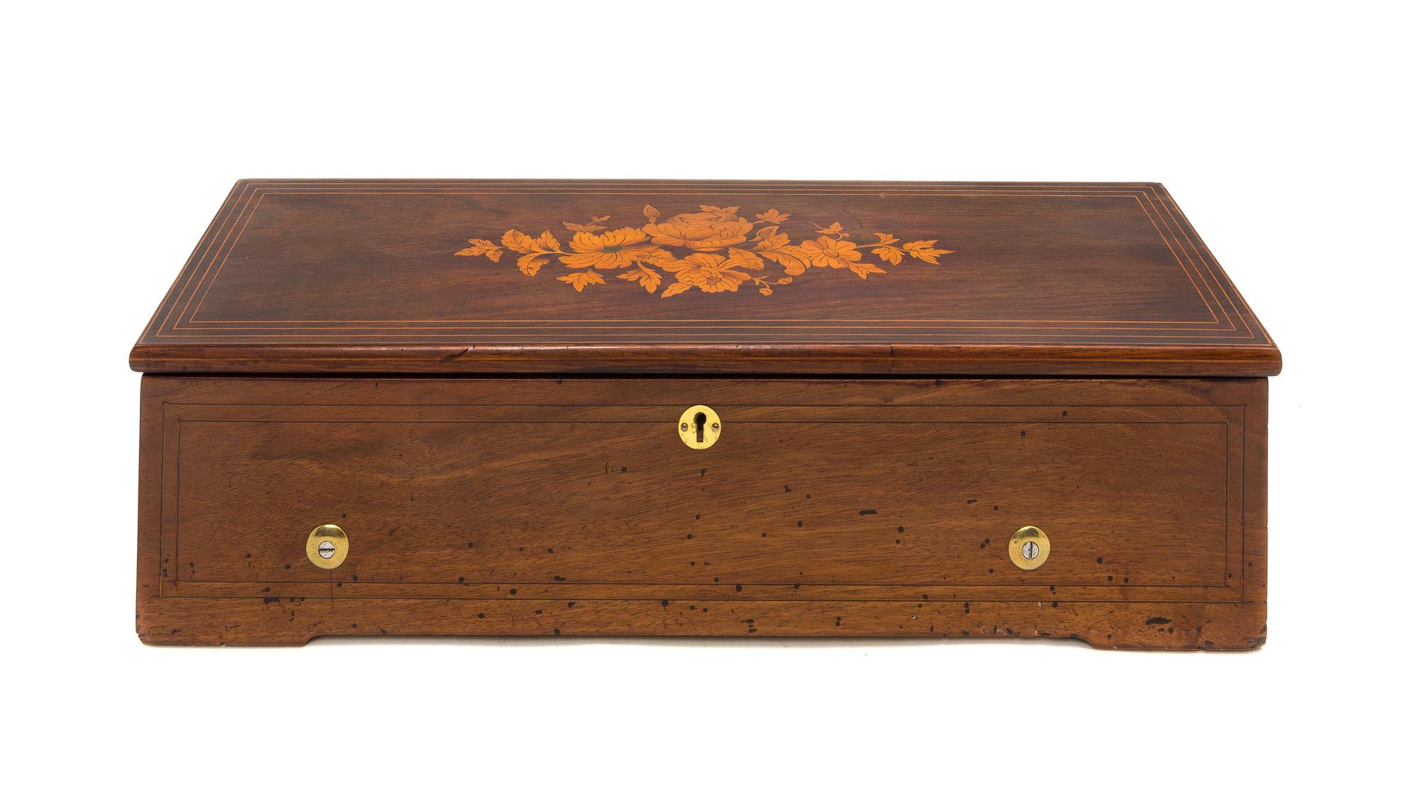 A Swiss Marquetry Cylinder Music Box, Height 5 3/8 x width 20 1/2 x depth 6 3/4 inches.