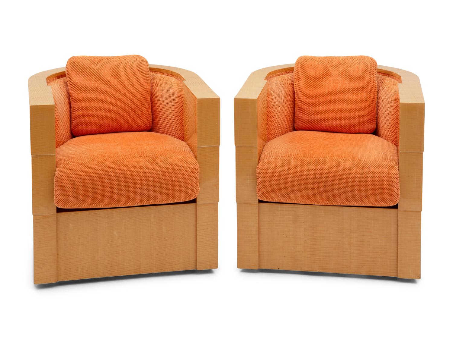 A Pair of Enrique Garcel Satinwood Club Chairs