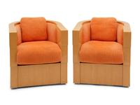 A Pair of Enrique Garcel Satinwood Club Chairs