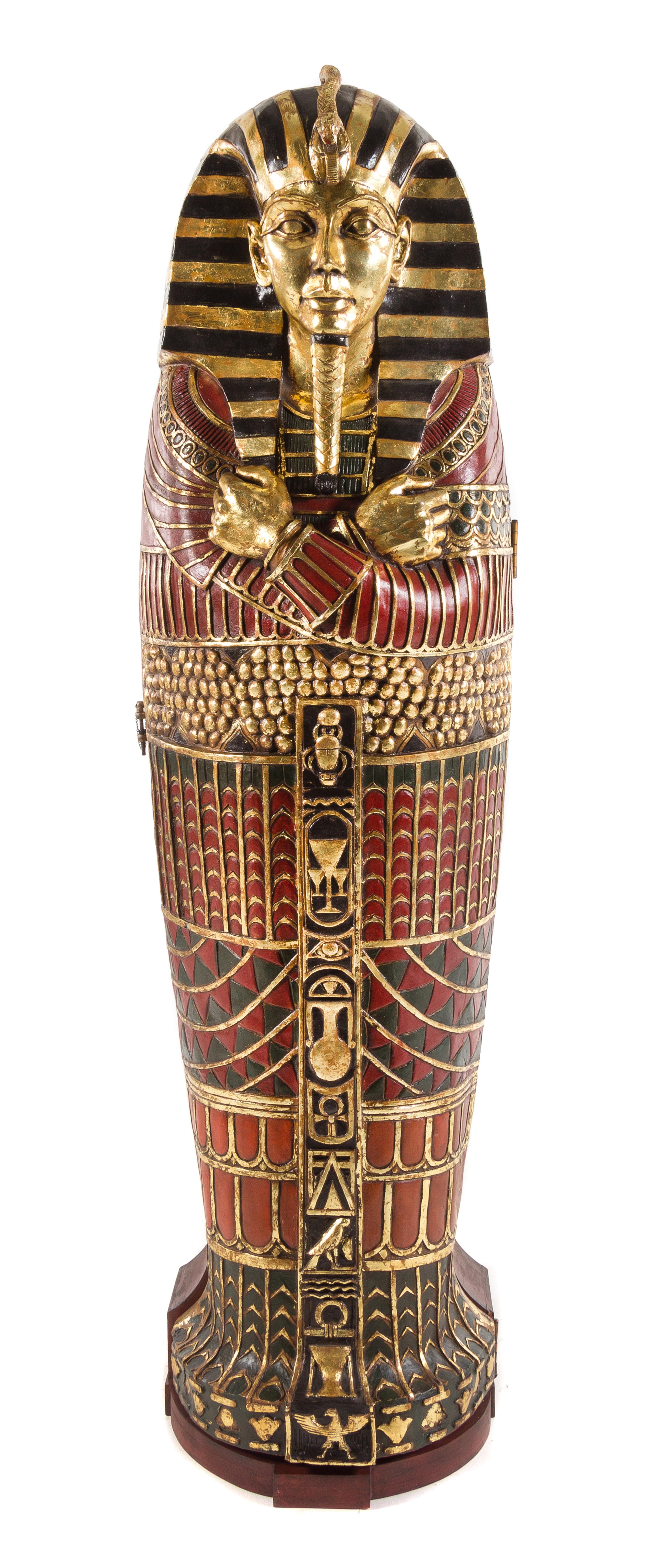 An Egyptian Style Painted Composition Sarcophagus Cabinet Height 74 1/2 inches. — 20TH CENTURY