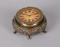 An Austrian Bronze Table Clock, Height overall 2 1/2 inches.