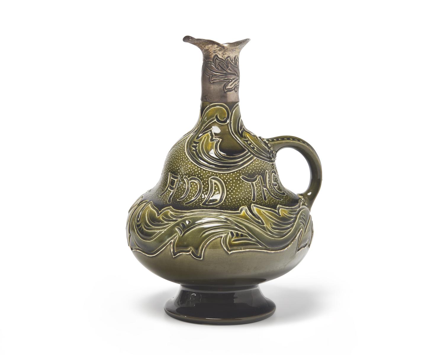 A Wedgwood Motto Jug with Applied Silver Spout