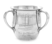 An American Silver Trophy Cup of Rowing Interest, Gorham Mfg. Co., Providence, RI, 1897, of Tyg form, the body engraved with a scene of