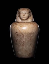 An Egyptian Alabaster Canopic Jar