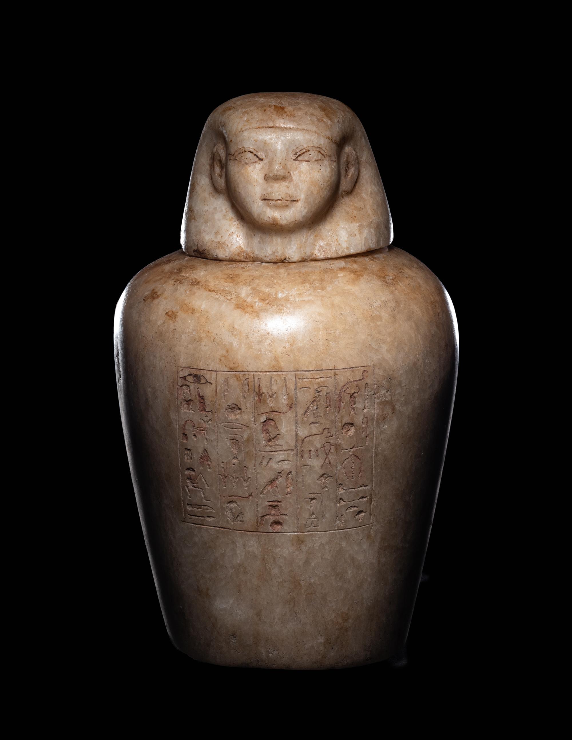An Egyptian Alabaster Canopic Jar