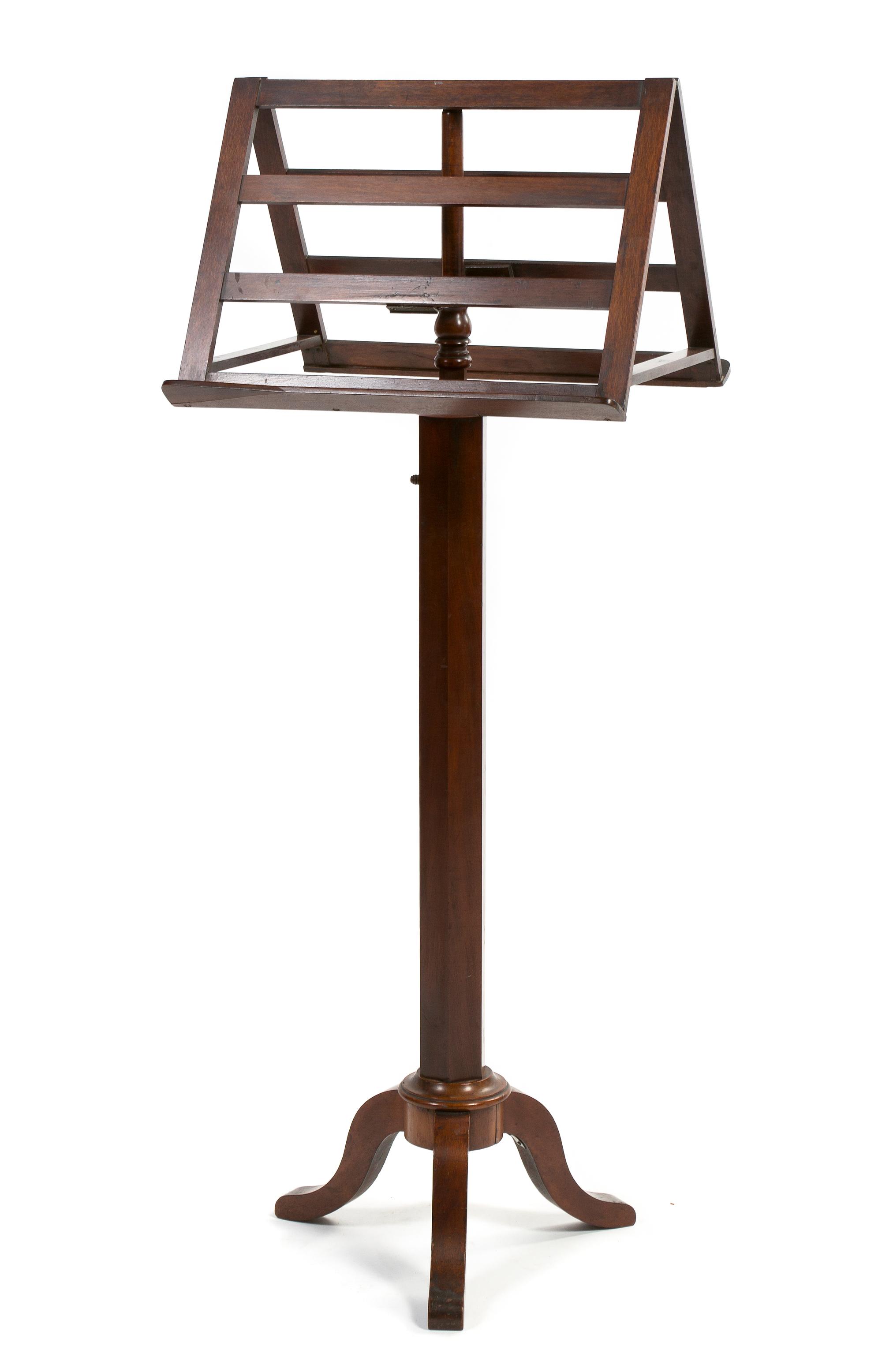 An English Mahogany Duet Music Stand, Height 49 3/4 inches.