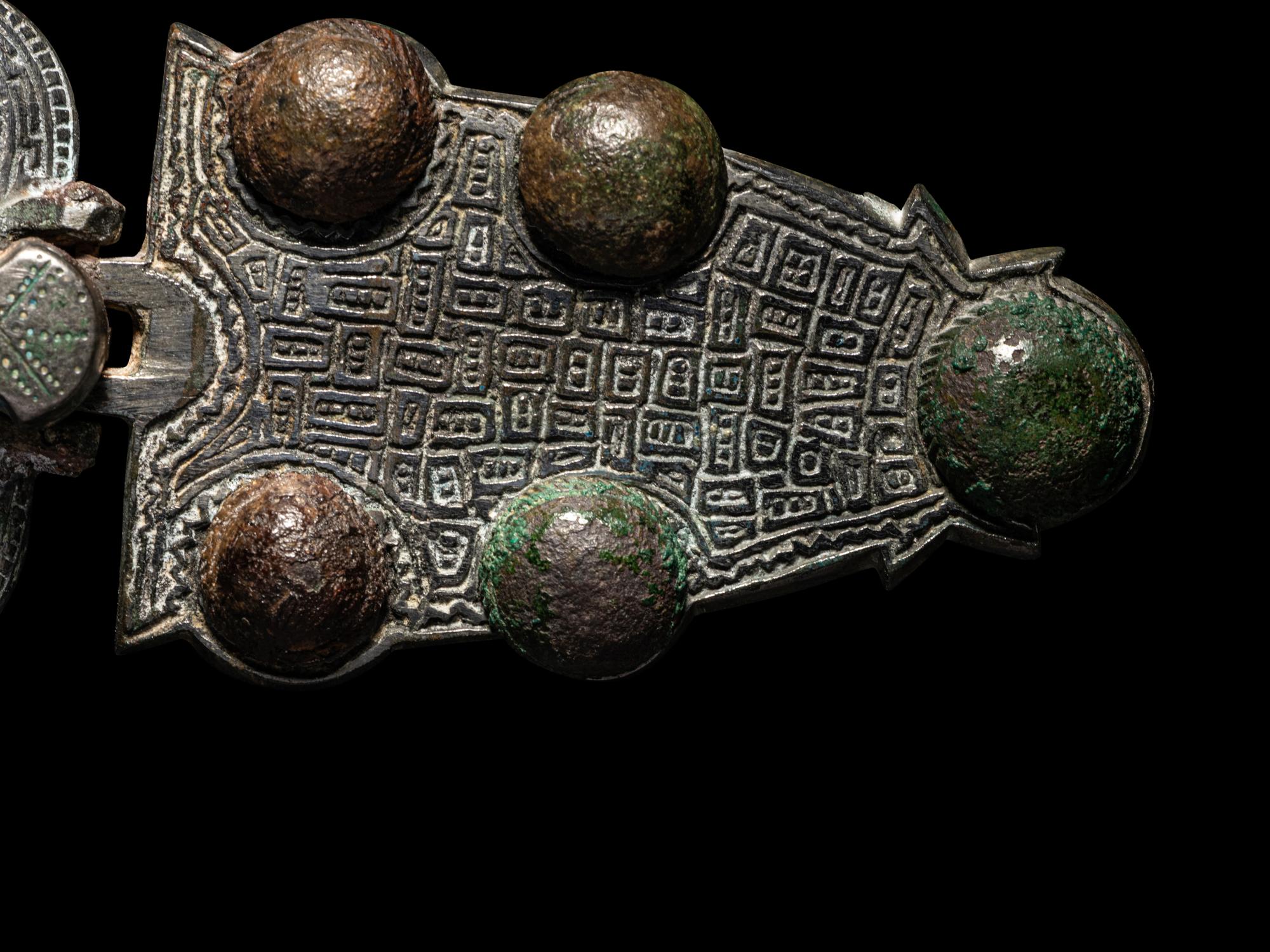 A Merovingian Bronze Belt Buckle