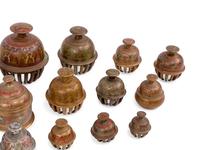 Twenty-One Middle Eastern Enameled Bronze Bells