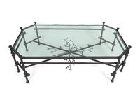 A Contemporary Bronze and Glass Cocktail Table — IN THE MANNER OF GIACOMETTI