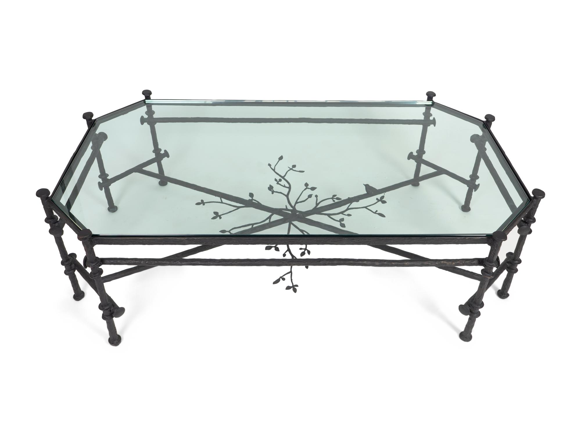 A Contemporary Bronze and Glass Cocktail Table — IN THE MANNER OF GIACOMETTI