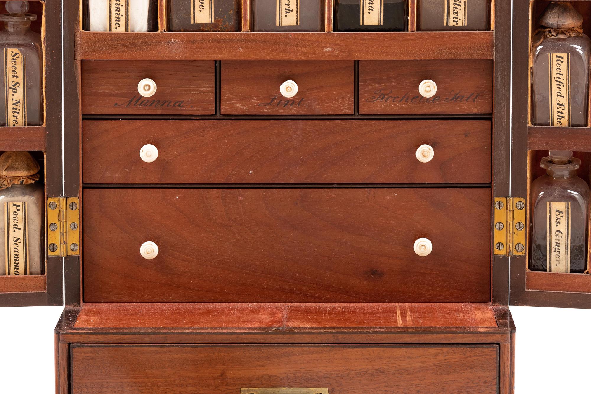 A Regency Figured Mahogany Travelling Apothecary Chest