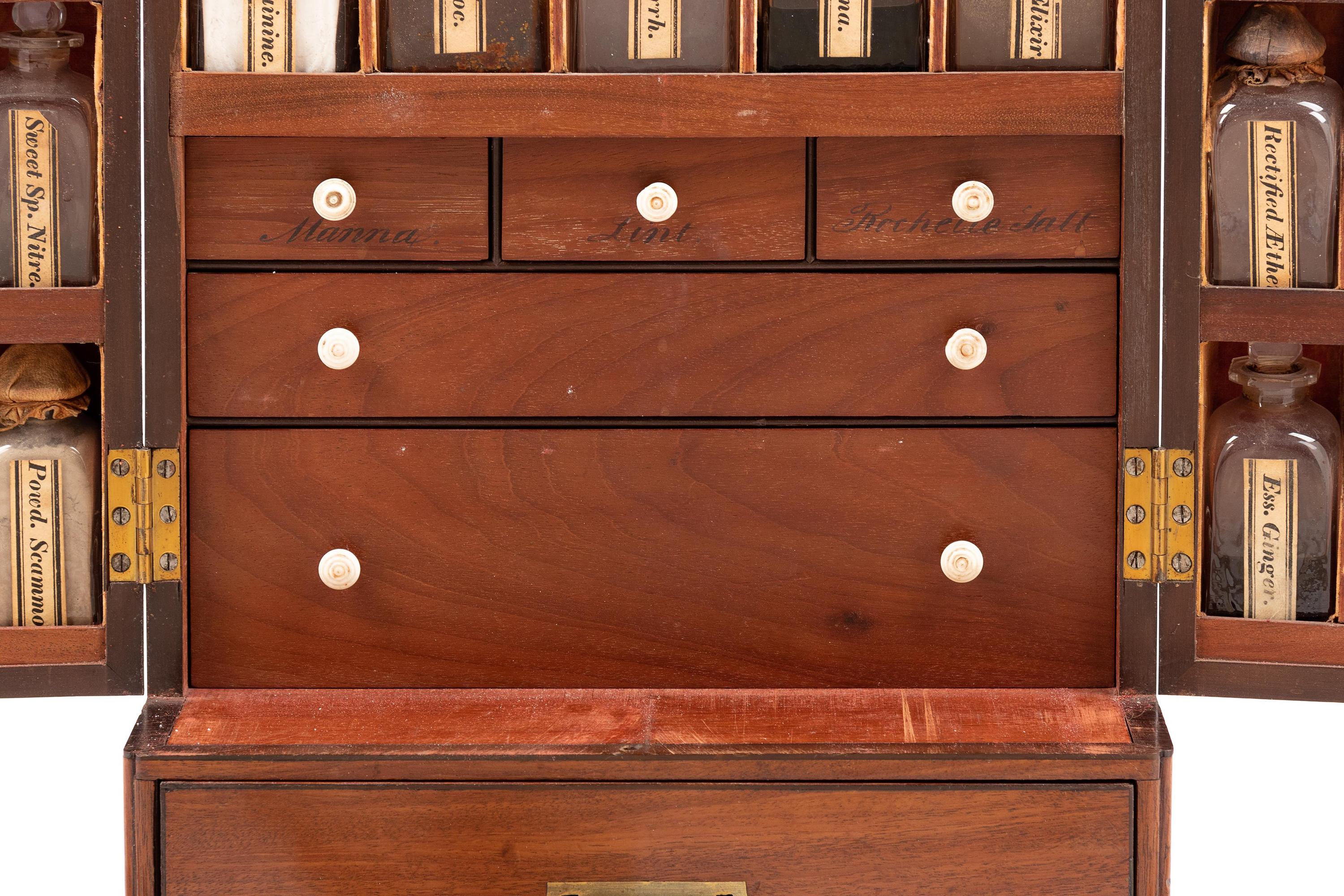 A Regency Figured Mahogany Travelling Apothecary Chest