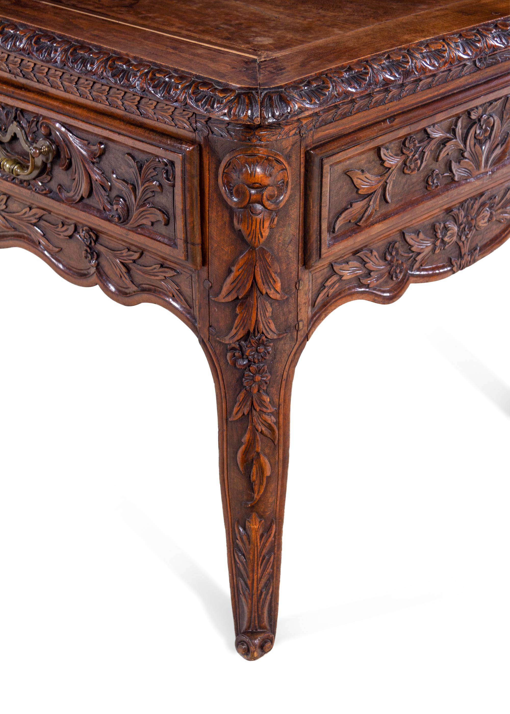 A Louis XV Provincial Style Carved Walnut Desk