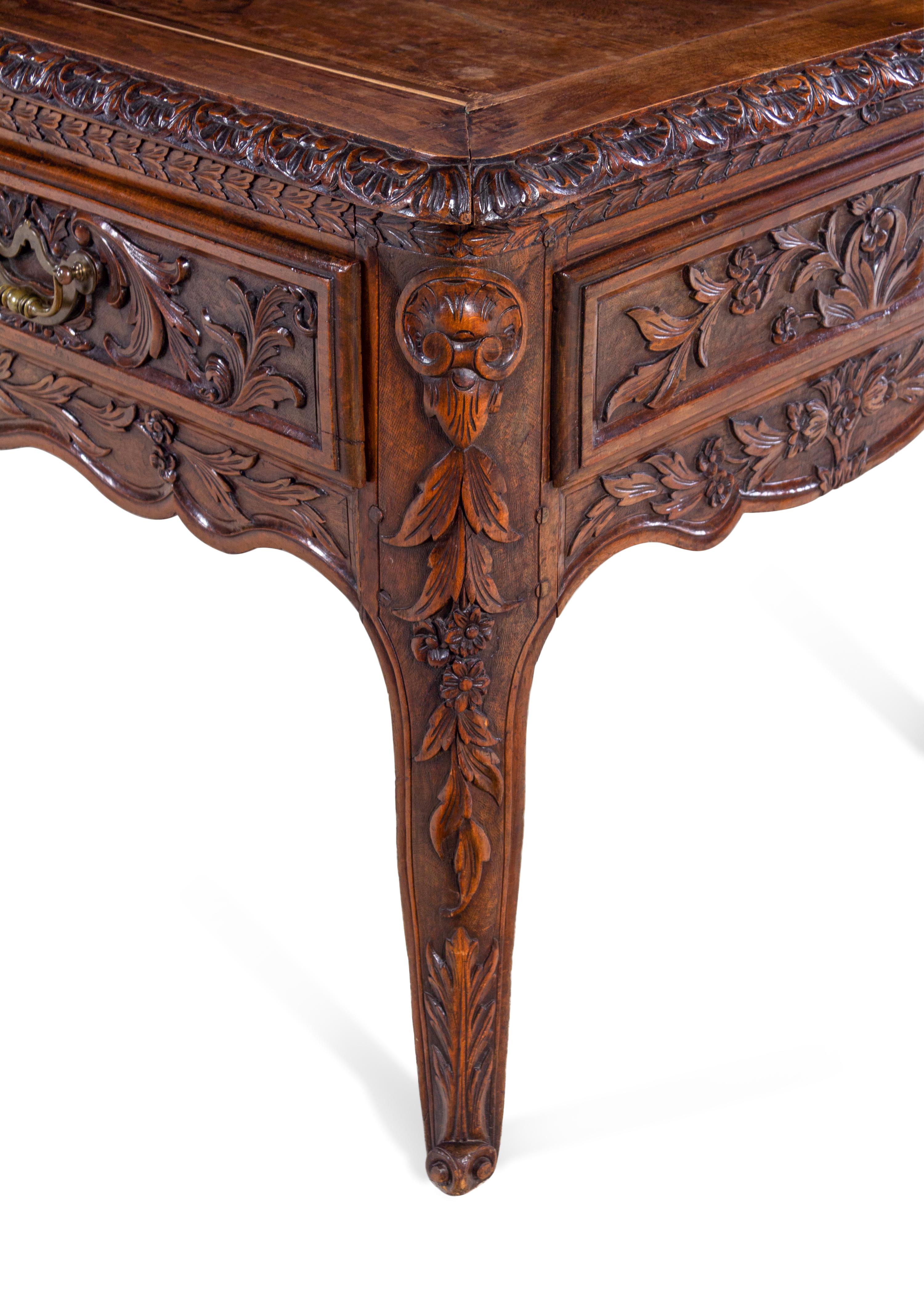 A Louis XV Provincial Style Carved Walnut Desk