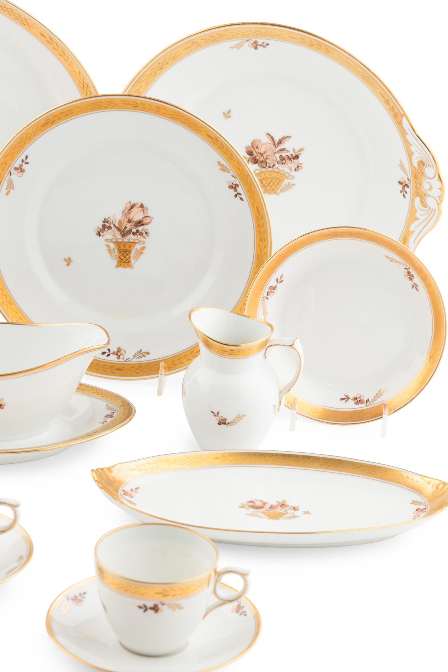 A Royal Copenhagen Golden Basket Porcelain Dinner Service