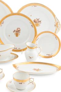 A Royal Copenhagen Golden Basket Porcelain Dinner Service