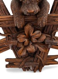 A Swiss "Black Forest" Carved Figural Coat Hook