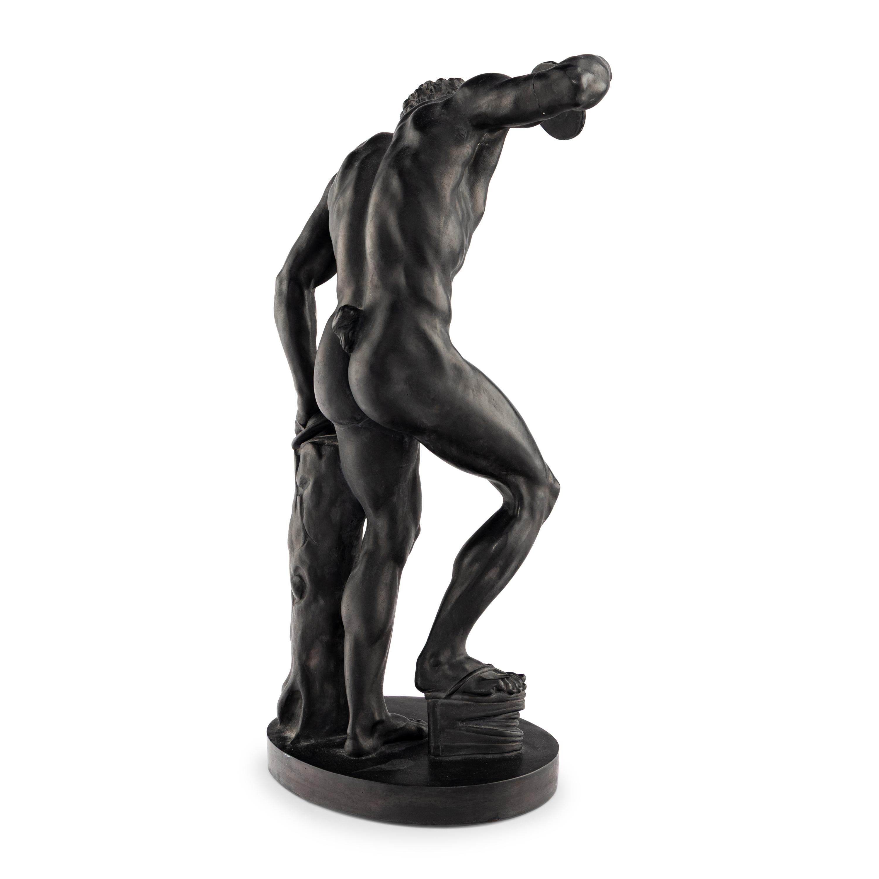 A Danish Black Ceramic Figure of a Dancing Faun