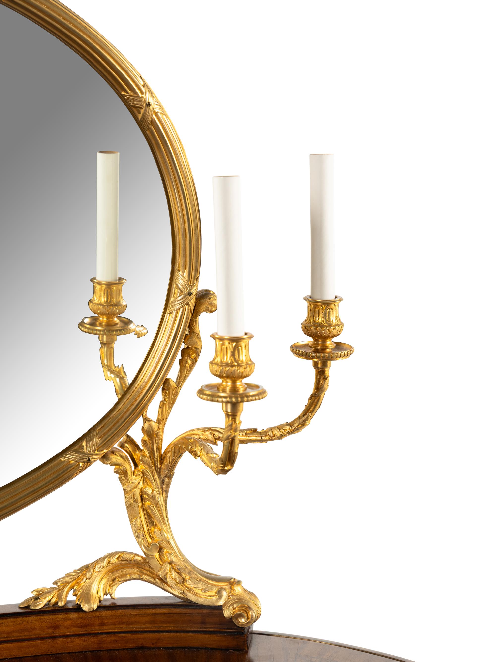A Louis XVI Style Gilt Bronze Mounted Mahogany Dressing Table and Mirror