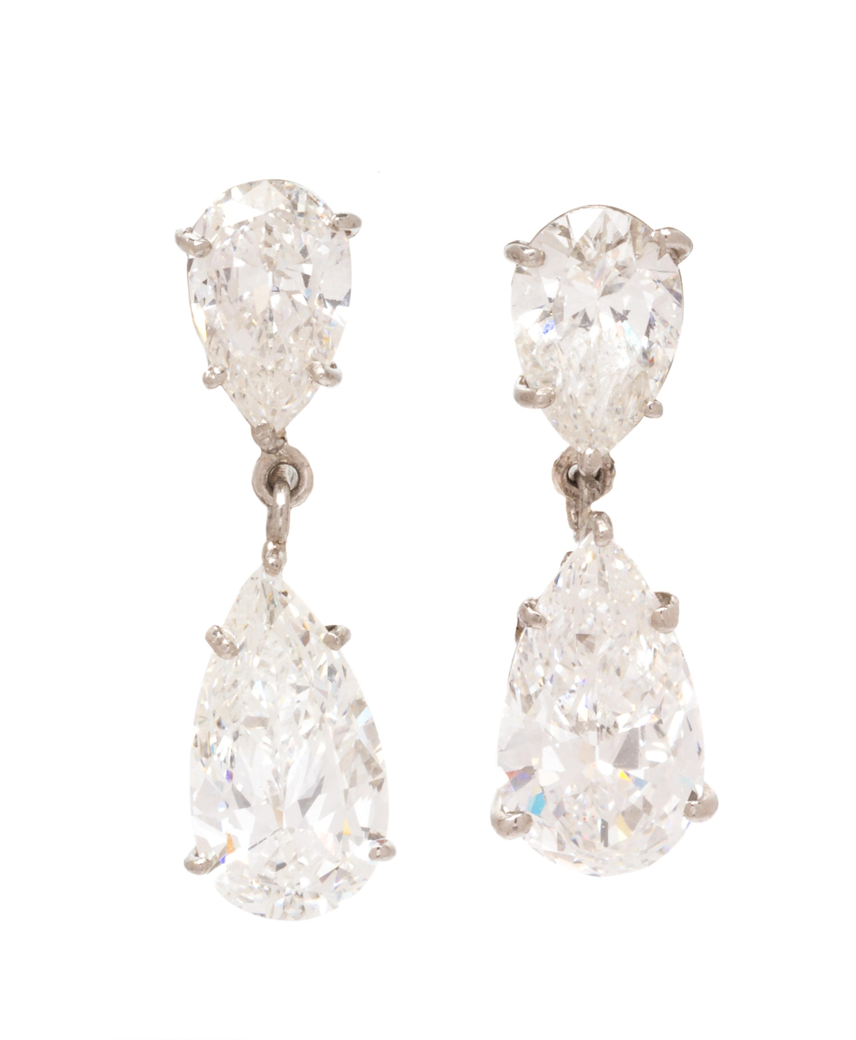 A Pair of Platinum and Diamond Drop Earclips, 3.40 dwts.