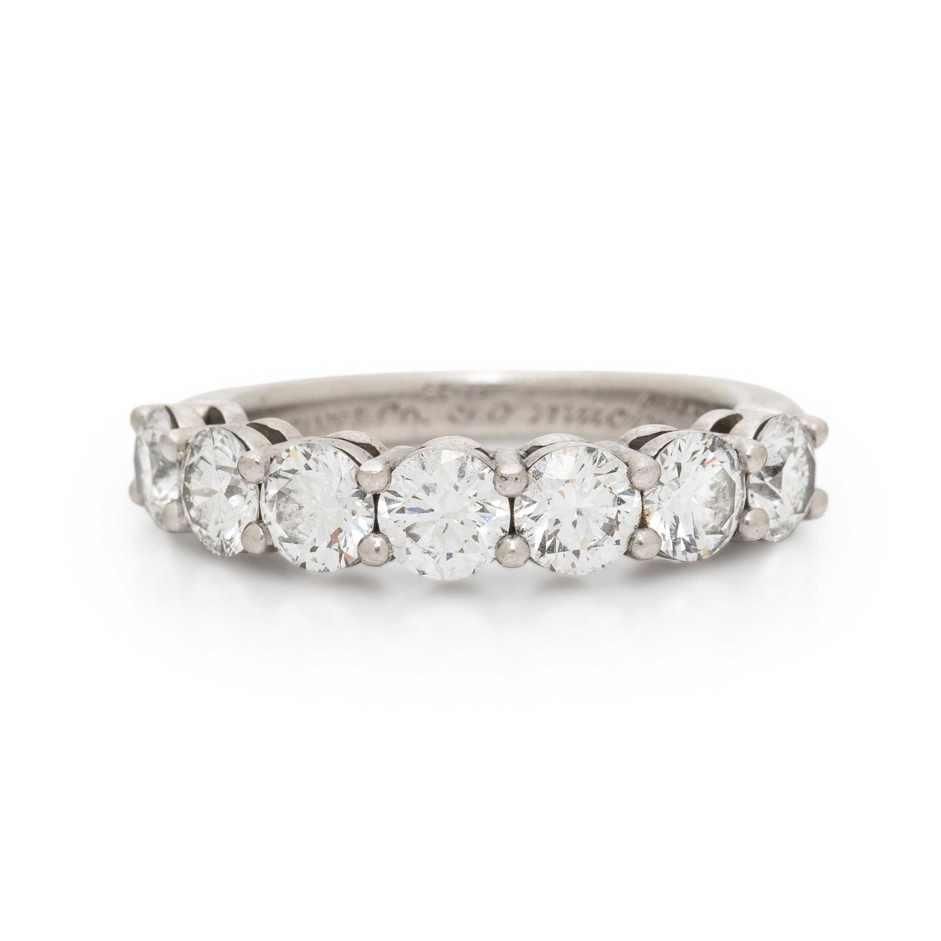 TIFFANY & CO., SEVEN DIAMOND AND PLATINUM RING