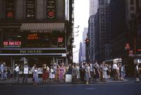 Ruth Orkin (1921-1985) Crossing Sixth Avenue, New York City, c. 1945-1949