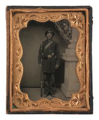 [CIVIL WAR]. Tintype portrait of a doubly armed soldier in full kit.