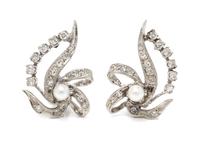 A Pair of 14 Karat White Gold, Cultured Pearl and Diamond Earclips, 4.30 dwts.