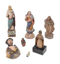 Seven Continental Carved and Polychromed Santos Figures