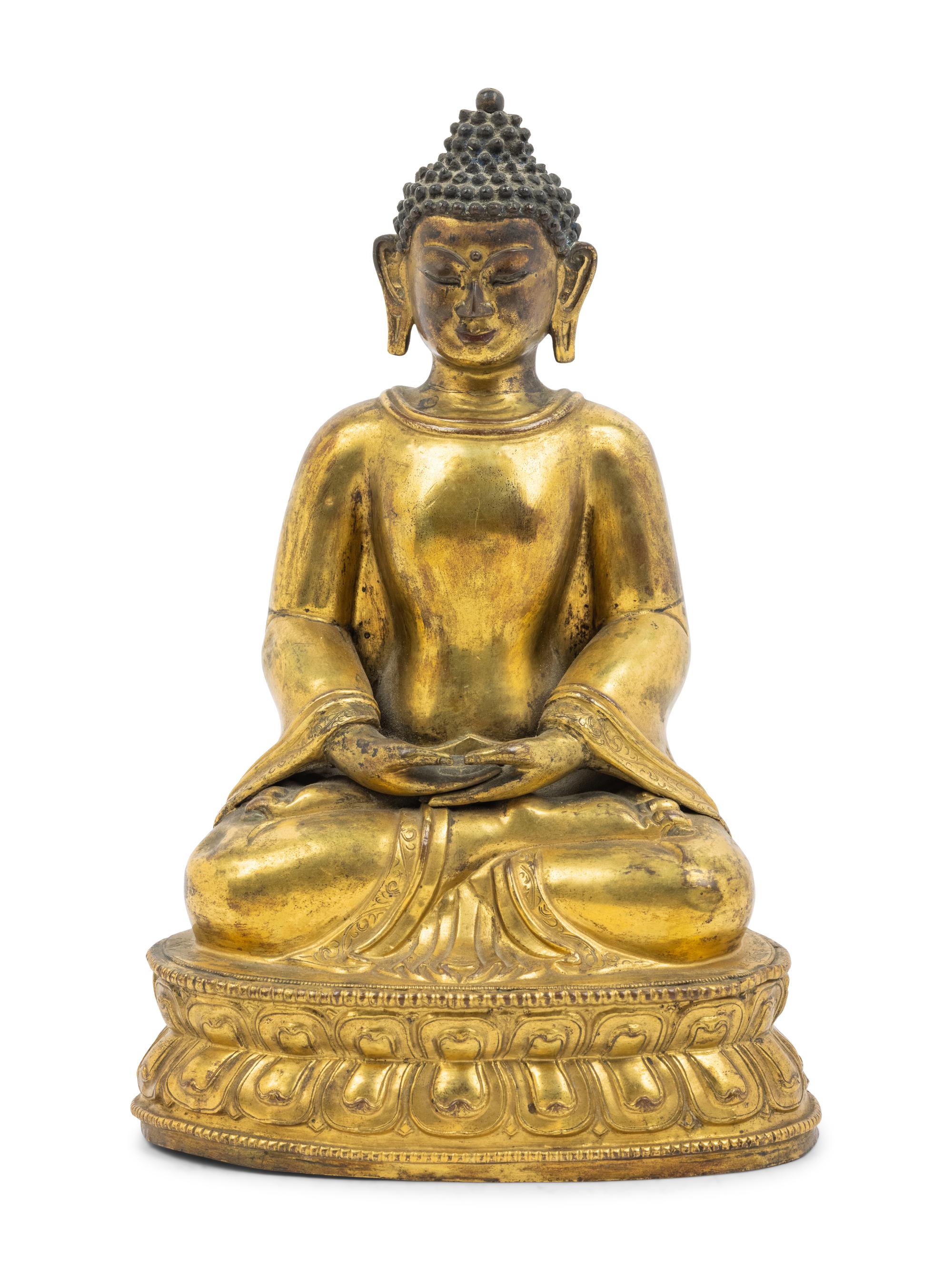 A Large Tibetan Gilt Bronze Figure of Seated Buddha