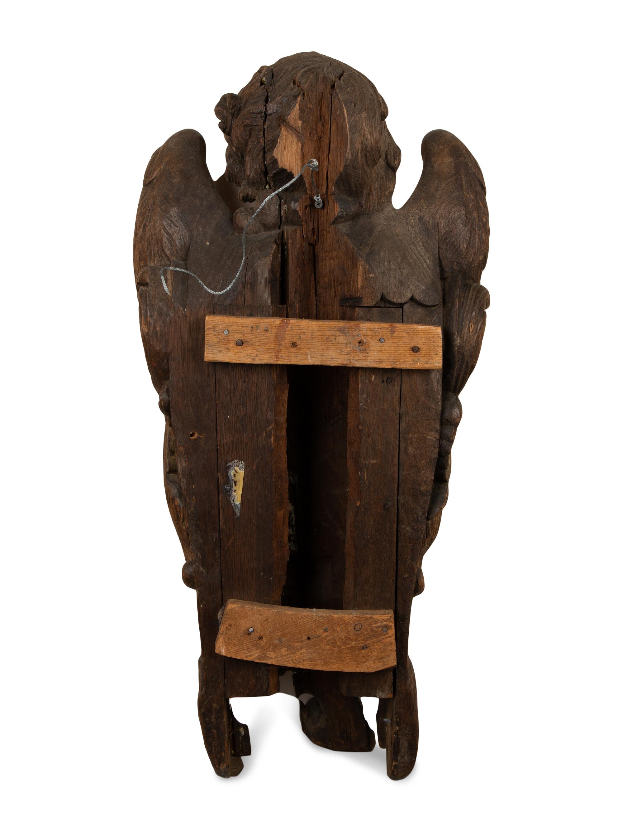 A Pair of Continental Oak Figural Pilasters — 17TH CENTURY