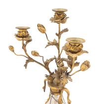 A Pair of French Gilt Bronze-Mounted Rock Crystal Three-Light Candelabra