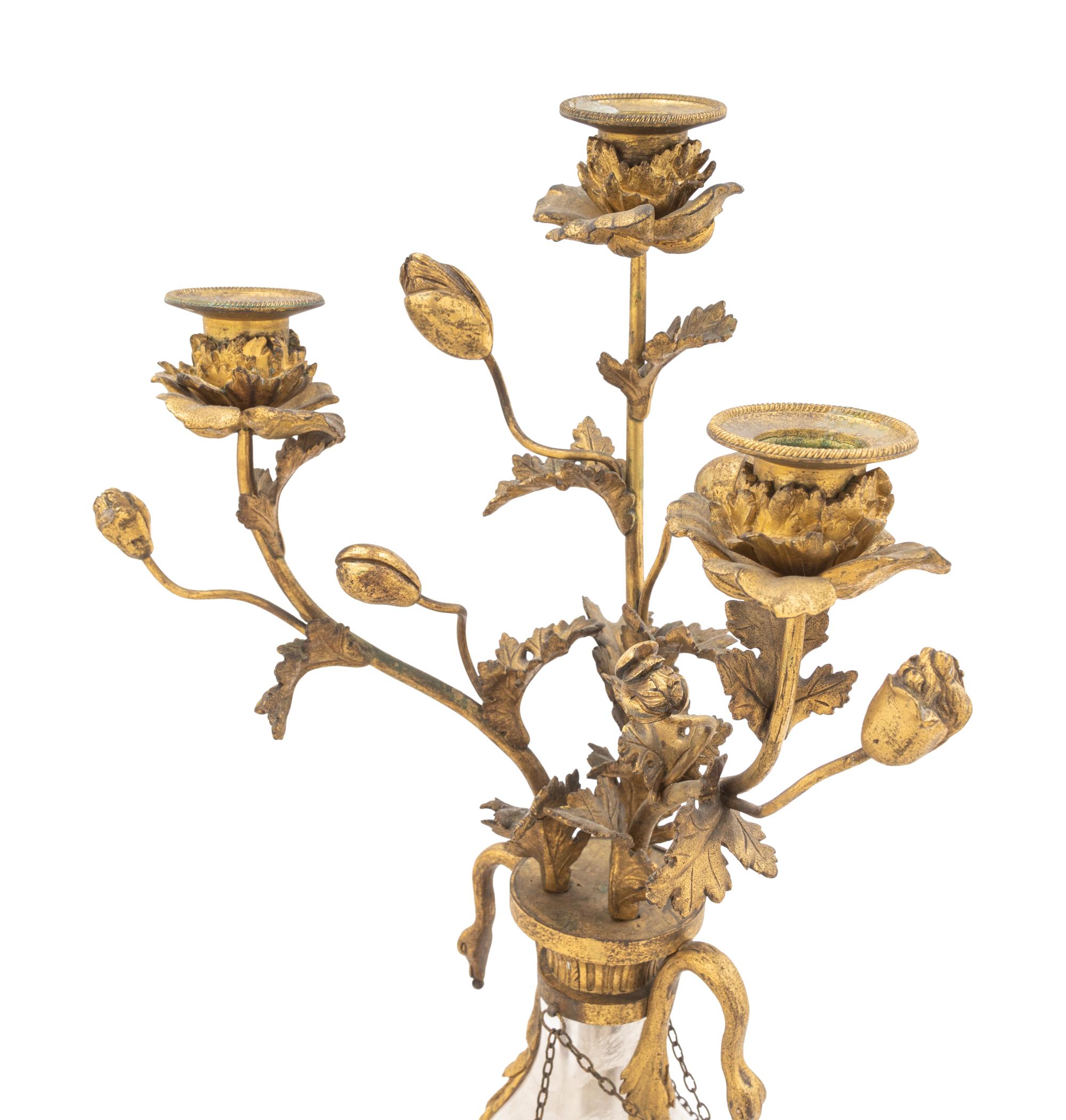A Pair of French Gilt Bronze-Mounted Rock Crystal Three-Light Candelabra
