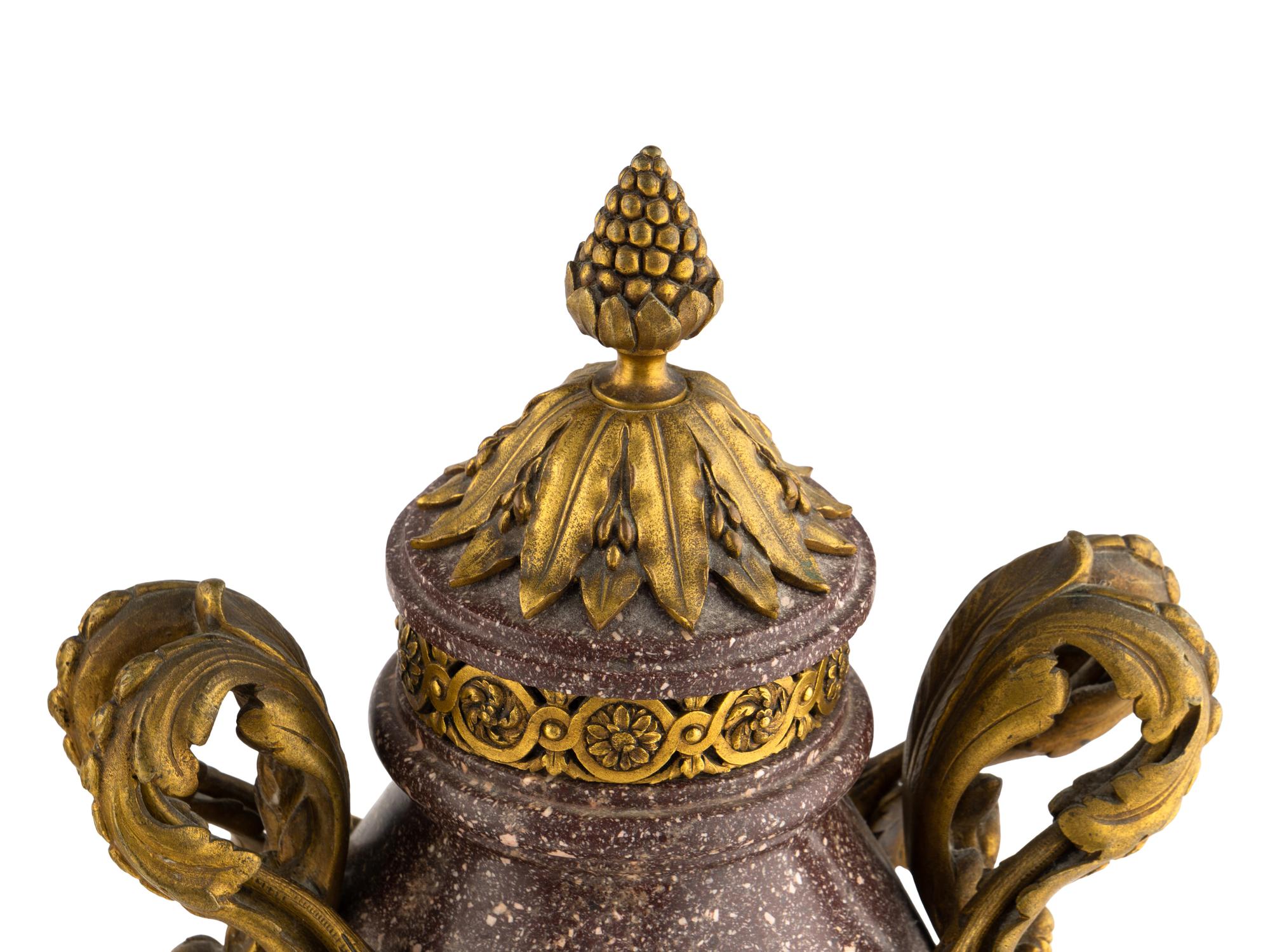 A Pair of Louis XV Style Gilt Bronze Mounted Porphyry Urns